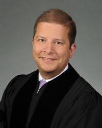 Justice Nels Peterson's Profile