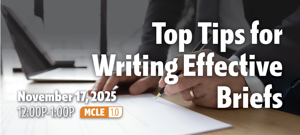 Person writing a brief by hand with seminar time and date