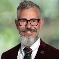 John Edwards, DC's Profile