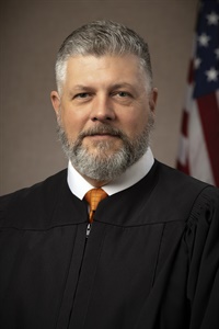 Hon. Myles Perry's Profile