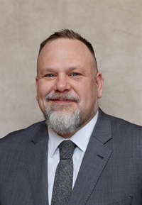 Hon. Justin Evans's Profile